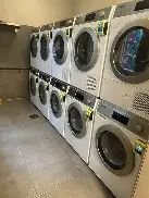 On-site laundry machines at Dzidzor (Joy) Hostel
